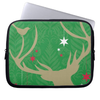 A silhouette of a deer with stars hanging from its laptop sleeve