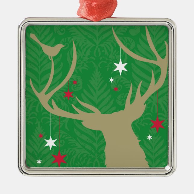 A silhouette of a deer with stars hanging from its metal ornament (Front)