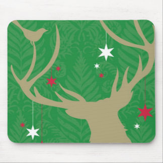 A silhouette of a deer with stars hanging from its mouse pad