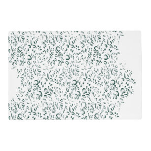 A silver drop splashes into a pool of white liquid placemat