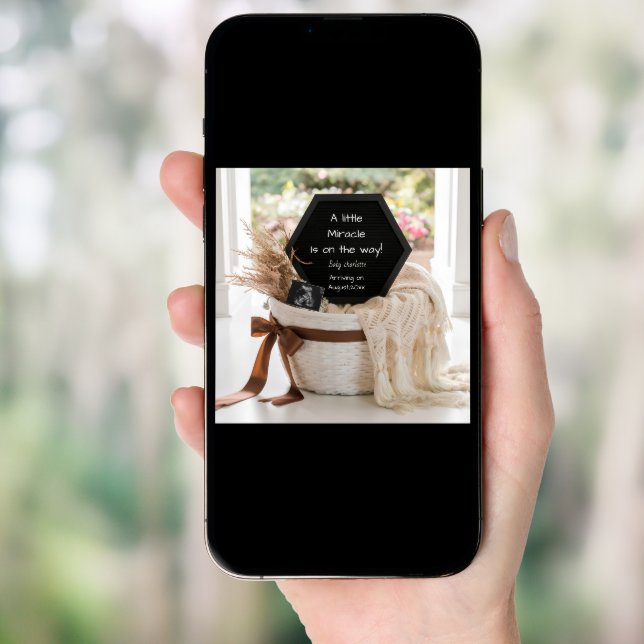 A simple neutral basket pregnancy announcement (Front Digital)