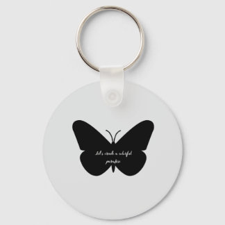 A simple quote in a simple butterfly keychain