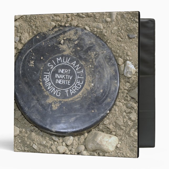 A simulated land mine binder (Front/Inside)