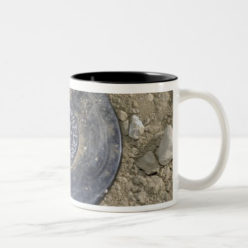 A simulated land mine Two_Tone coffee mug