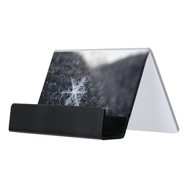 A single snowflake on stands out desk business card holder (Angled Front)