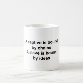 A slave is bound by ideas coffee mug