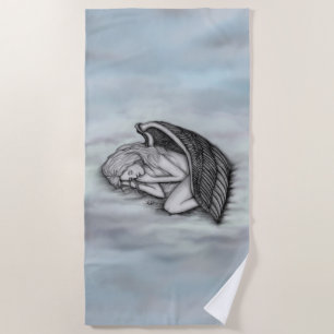 A sleeping Angel on the heavens clouds Beach Towel