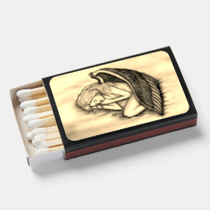 A sleeping Angel on the heavens clouds Matchboxes