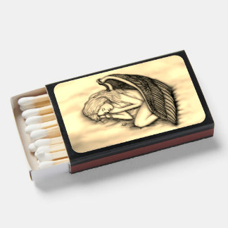 A sleeping Angel on the heavens clouds Matchboxes