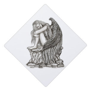 A sleeping Angel on the Stone Graduation Cap Topper