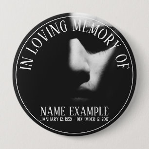 A sleeping face in half shadow button