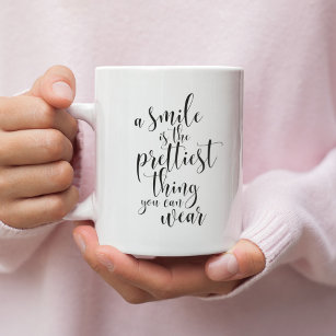 A smile is the prettiest thing you can wear coffee mug