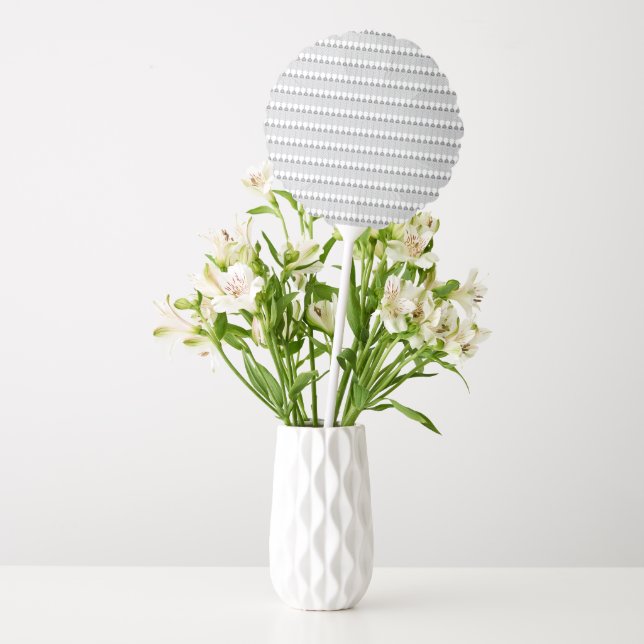 A snow-covered mountain range under a clear blue s balloon (Vase)