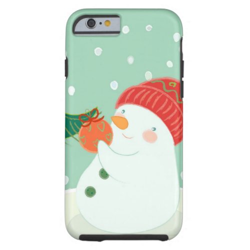 A snowman hanging an ornament on a tree tough iPhone 6 case