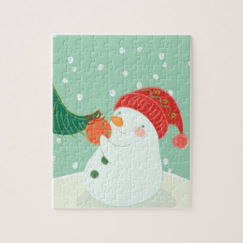 A snowman hanging an ornament on a tree jigsaw puzzle