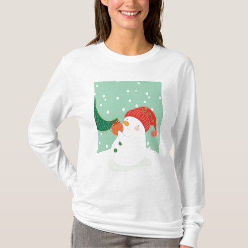 A snowman hanging an ornament on a tree T_Shirt