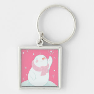 A snowman reaching for a falling snowflake keychain