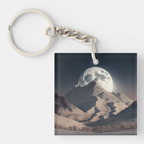 A snowy mountain range under the radiant moonlight keychain