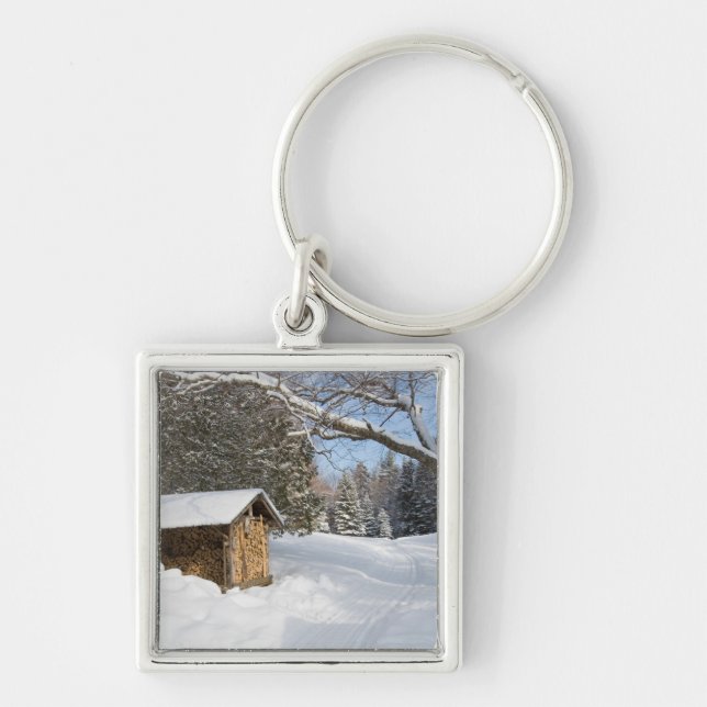 A snowy scene at the AMC's Little Lyford Pond Keychain (Front)