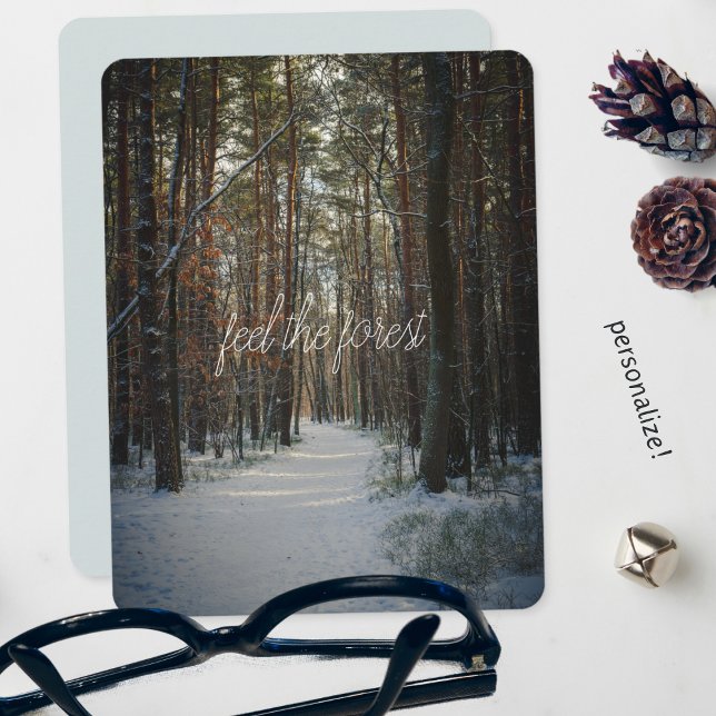 A snowy trail in a winter pine forest holiday card (Creator Uploaded)