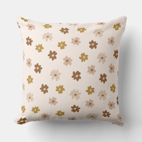 A soft beige with pink gold and brown flowers throw pillow