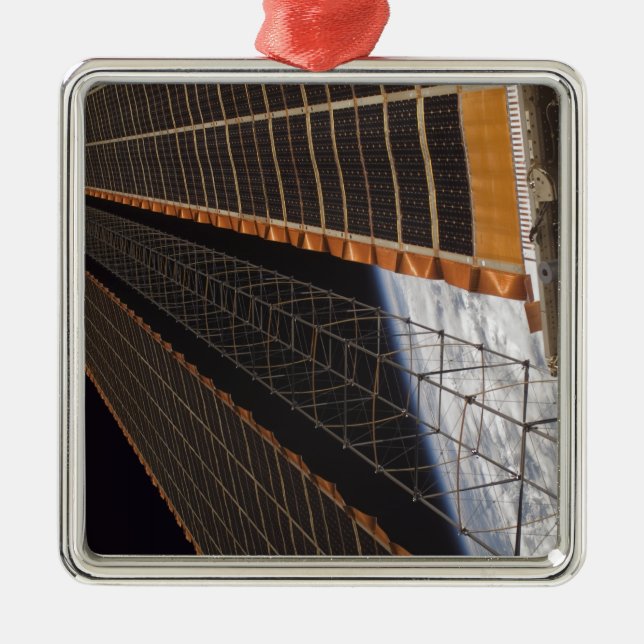A solar array wing metal ornament (Front)