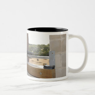 A soldier acts as an opposition force Two-Tone coffee mug