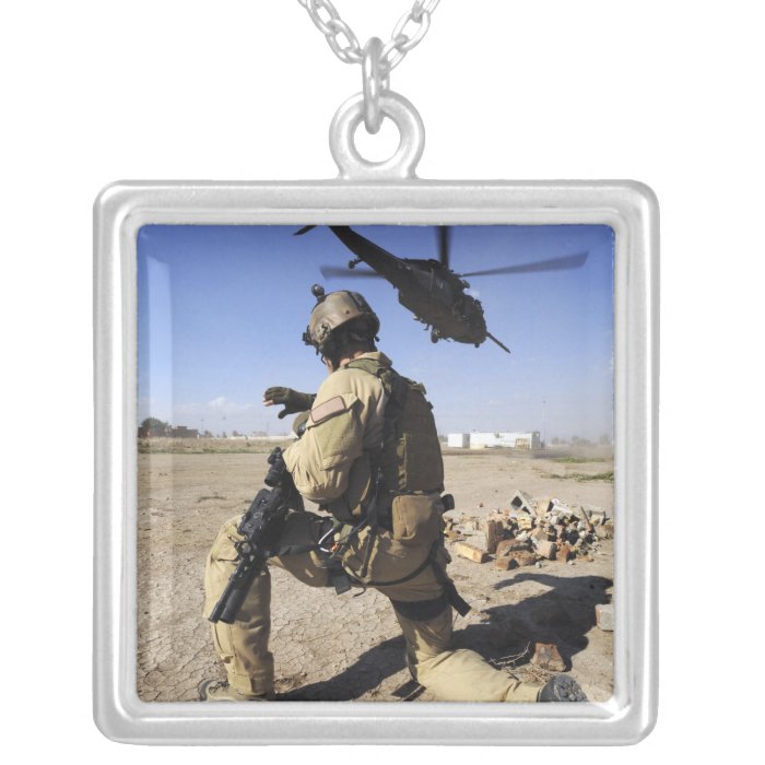 A soldier conducts security for an HH 60 Personalized Necklace