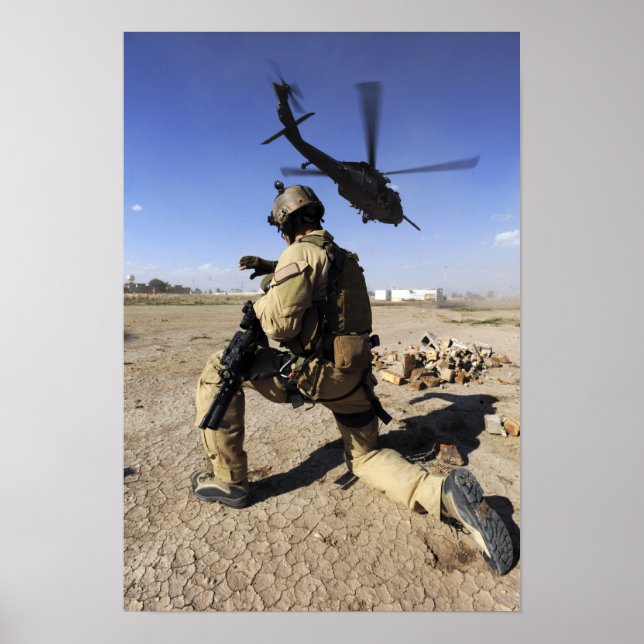 A soldier conducts security for an HH-60 Poster (Front)