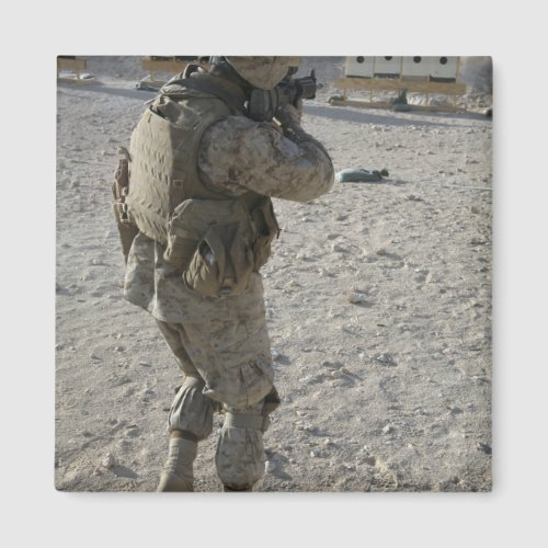 A soldier engages his target on a shooting rang magnet