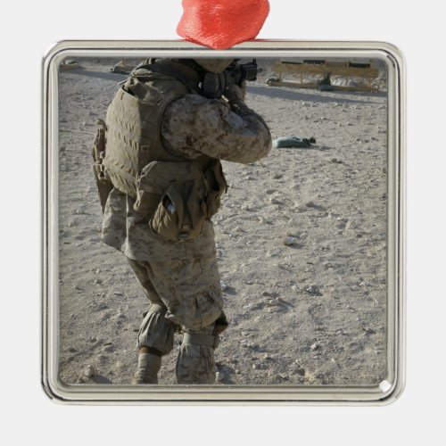 A soldier engages his target on a shooting rang metal ornament