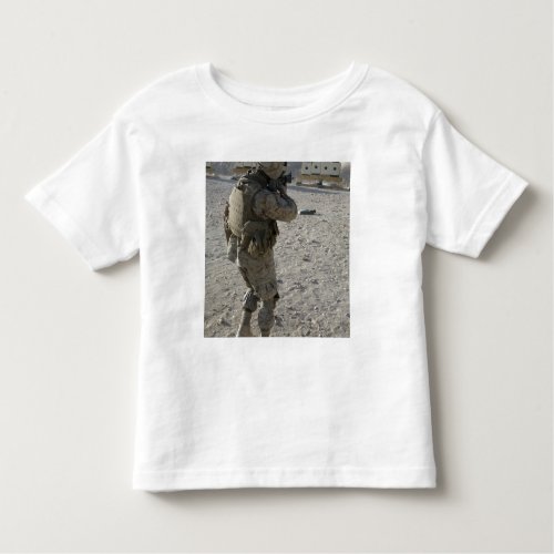 A soldier engages his target on a shooting rang toddler t_shirt