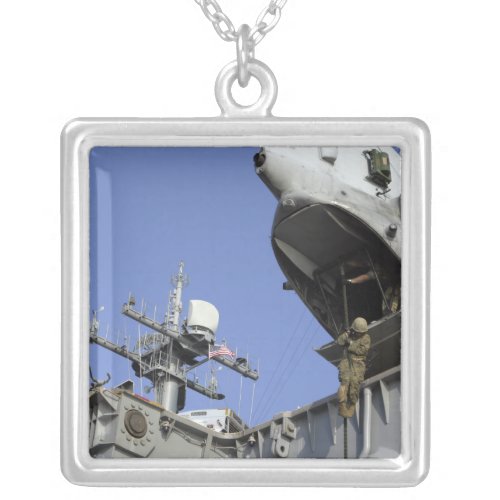 A soldier fast_ropes silver plated necklace