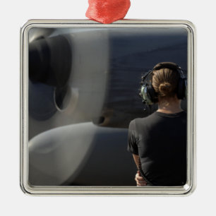 A soldier monitors the performance metal ornament