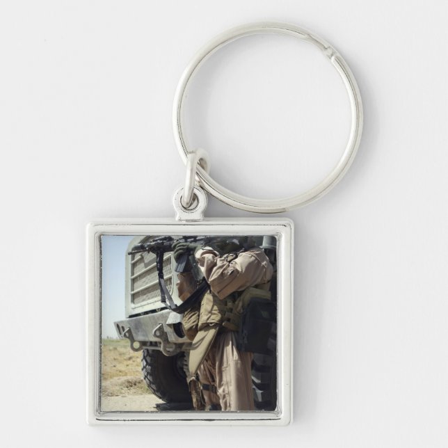 A soldier provides security for Marines Keychain (Front)
