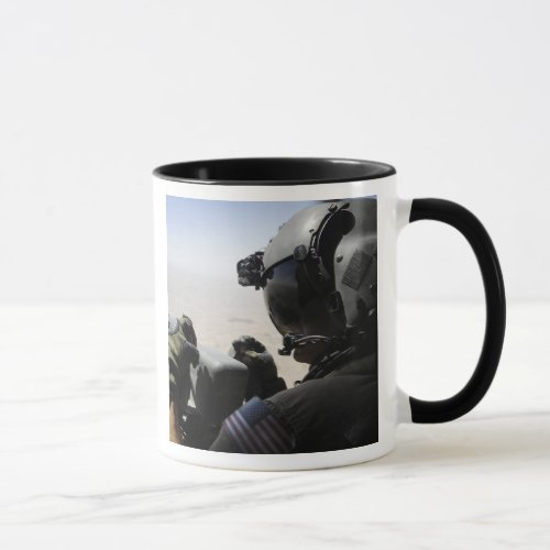 A soldier provides security mug