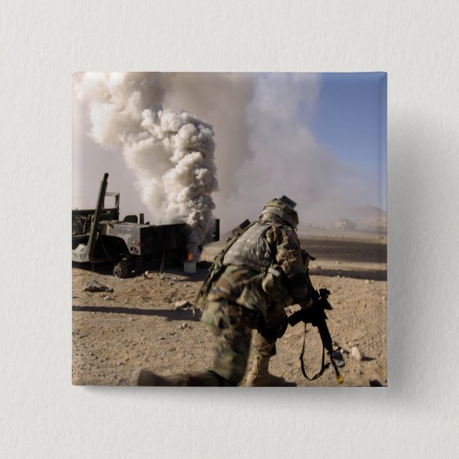 A Soldier reacts to a controlled explos Button (Front)