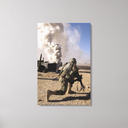 A Soldier reacts to a controlled explos Canvas Print