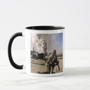A Soldier reacts to a controlled explos Mug