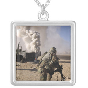 A Soldier reacts to a controlled explos Silver Plated Necklace
