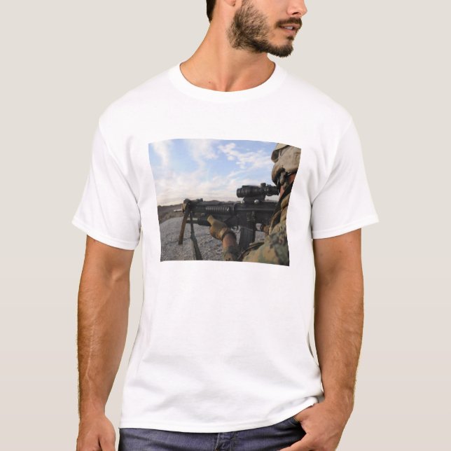 A soldier sights in to fire on a target T-Shirt (Front)