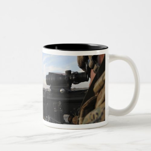 A soldier sights in to fire on a target Two_Tone coffee mug