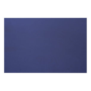 A solid blue background with no other visible elem wood wall art