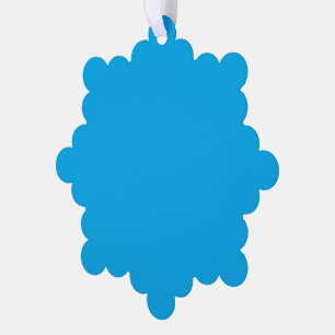 A solid bright blue background fills ornament card