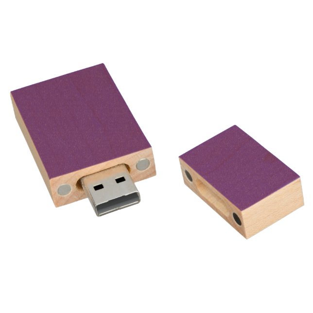 A solid purple background with a white square cent wood flash drive (Angled)