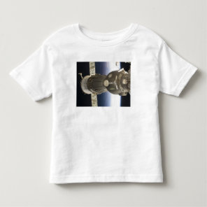 A Soyuz spacecraft backdropped by Earth Toddler T-shirt