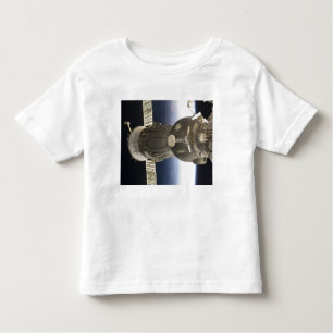A Soyuz spacecraft backdropped by Earth Toddler T-shirt
