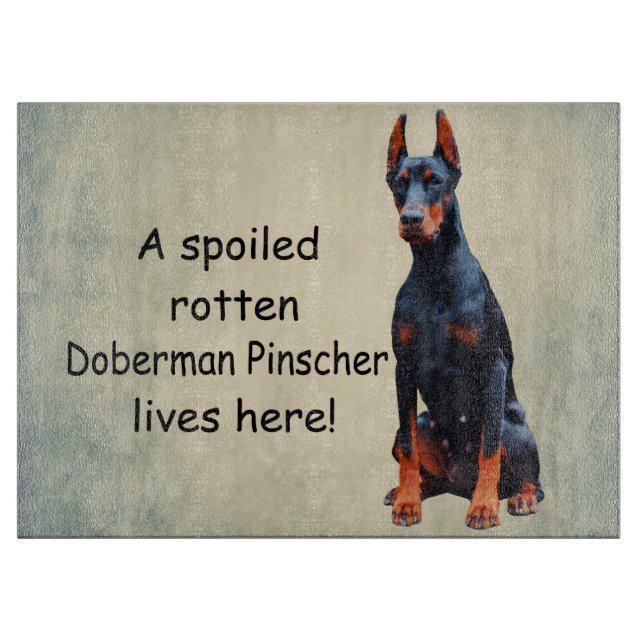 A Spoiled Rotten Doberman Pinscher Lives Here Cutting Board (Front)