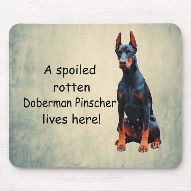 A Spoiled Rotten Doberman Pinscher Lives Here Mouse Pad (Front)