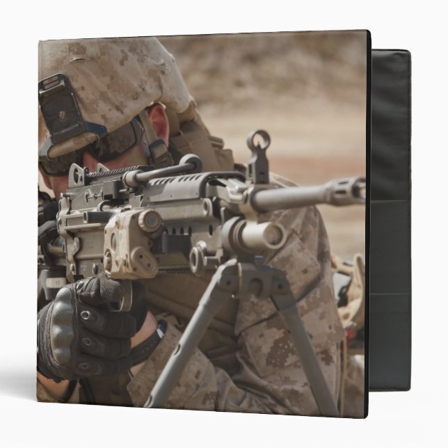 A squad automatic weapon gunner provides securi 3 ring binder (Front/Inside)
